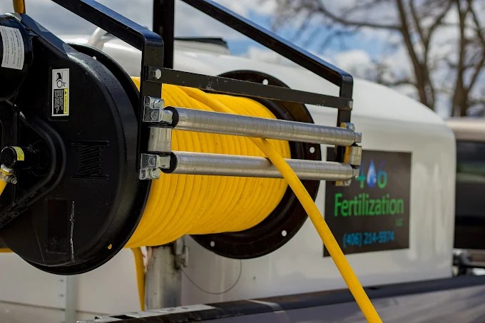 yellow hose used to spray fertilizer and weed control